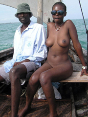 Nigeria Black Women Porn - Mature black woman from Nigeria fucked on a boat with three blacks.