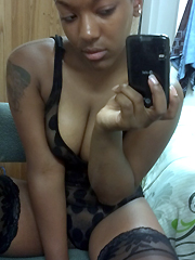 Ebony cutie in splotched lingerie makes sexy self-shot photos at lodging